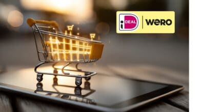 Winkelwagentje op een tablet met het iDEAL | Wero-logo, symbool voor de overgang naar Europees online betalen.